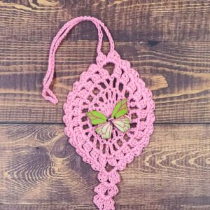 Green and Pink Butterfly on Pastel Pink