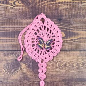 Magenta and Black Butterfly on Pastel Pink