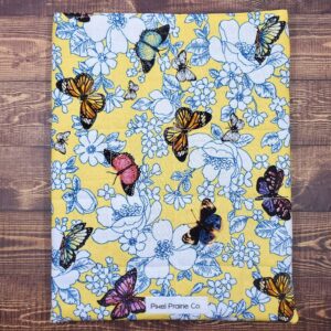 Butterfly Frenzy on Yellow Book Sleeve